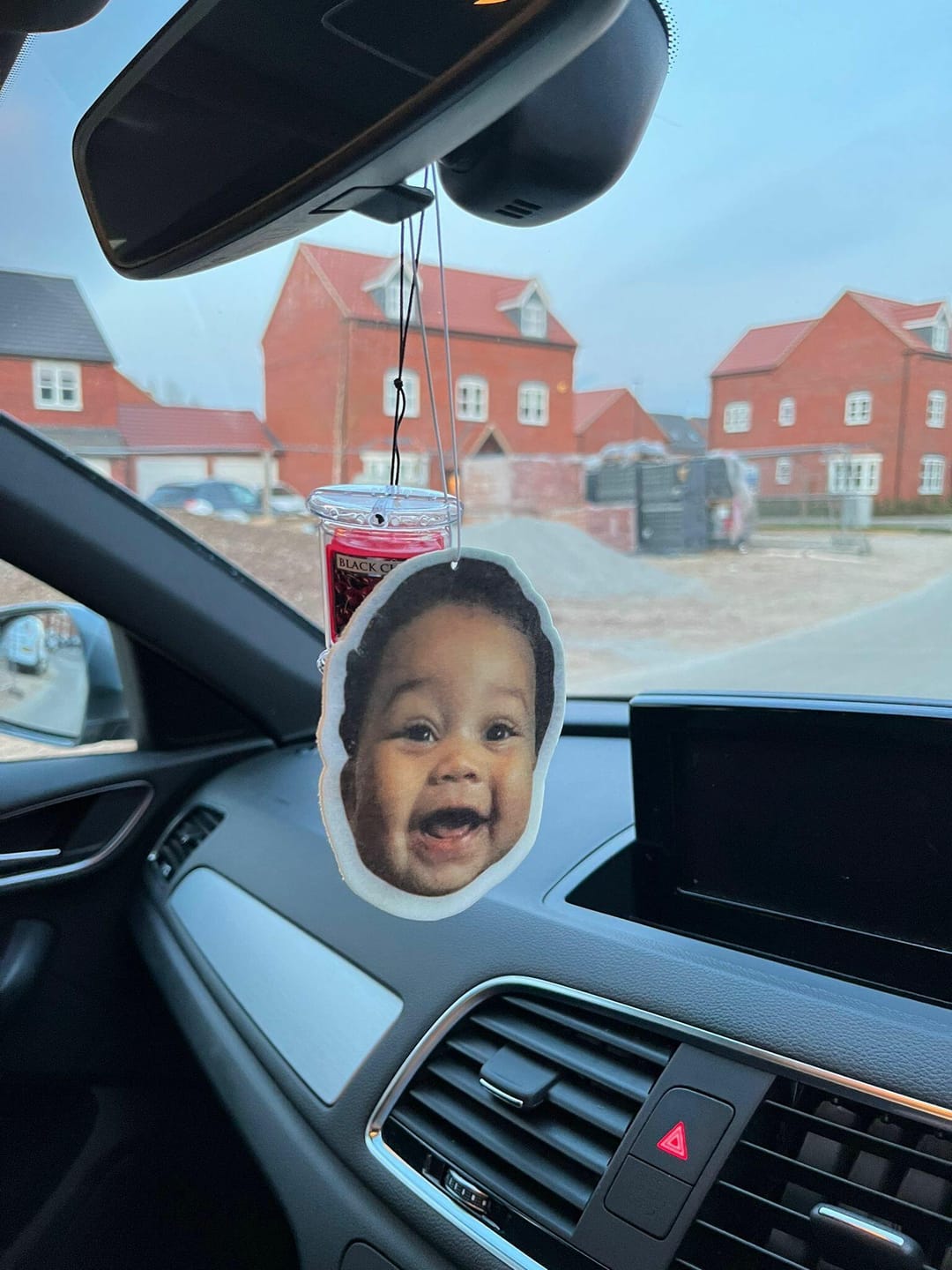 Baby's face on a custom air freshener by PhotoFresh.co.uk